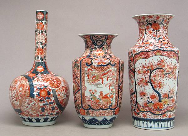 Appraisal: Three Japanese style porcelain vases One of stick neck and