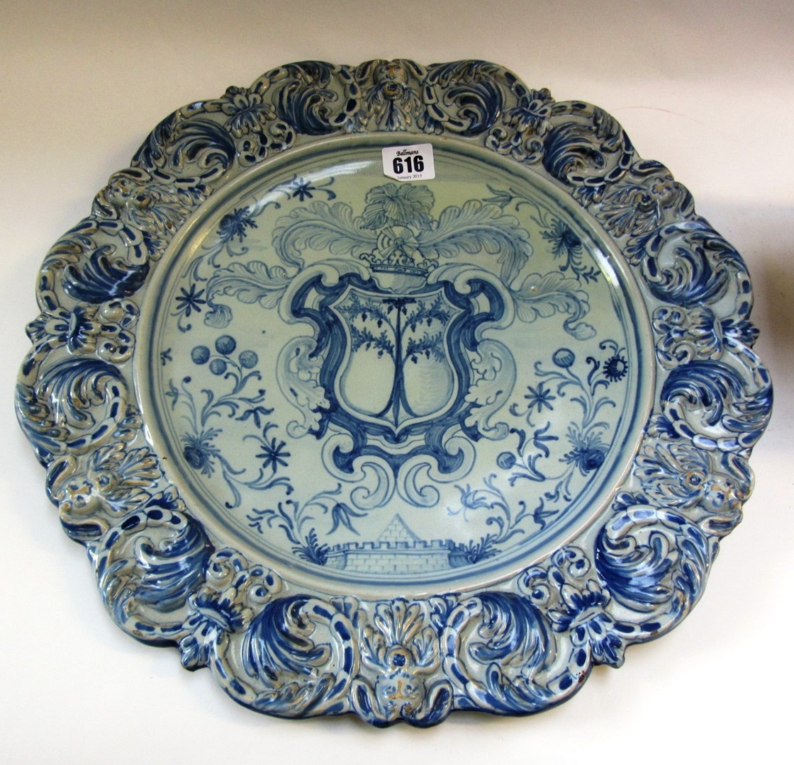 Appraisal: A Pavia armorial charger and an Italian maiolica spirit barrel