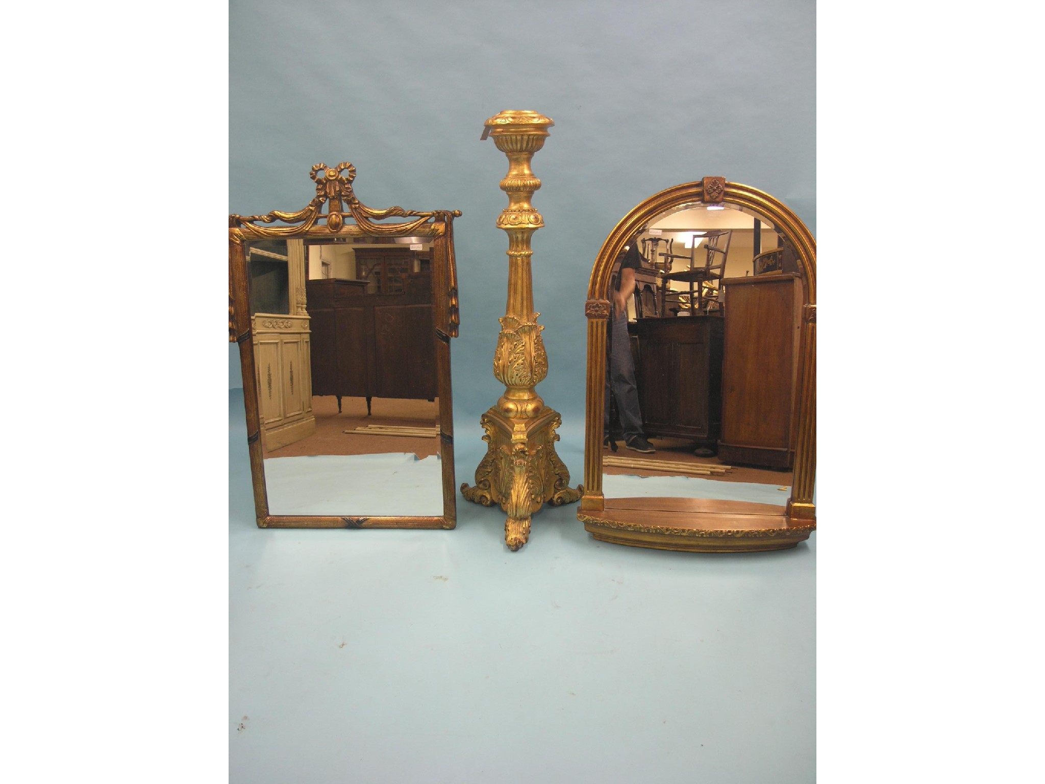 Appraisal: A moulded gilt pier glass domed-shape with fluted columns ft