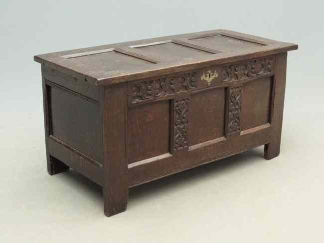 Appraisal: th c carved and paneled front oak coffer '' W