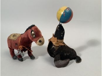 Appraisal: Two vintage windup toys made in Occupied Japan A donkey