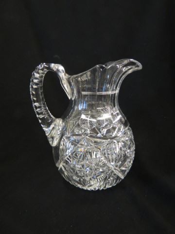 Appraisal: Cut Glass Pitcher fancy cutwork heavy blank bulbous base brilliant