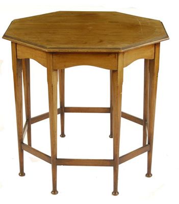 Appraisal: A Liberty Co style walnut table octagonal section on eight