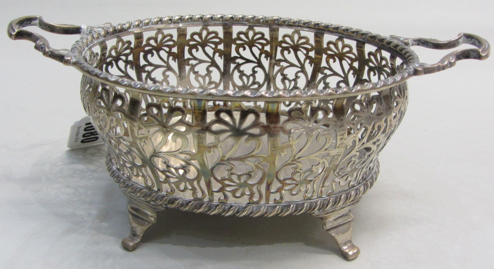 Appraisal: A silver twin handled bonbon basket of oval form with