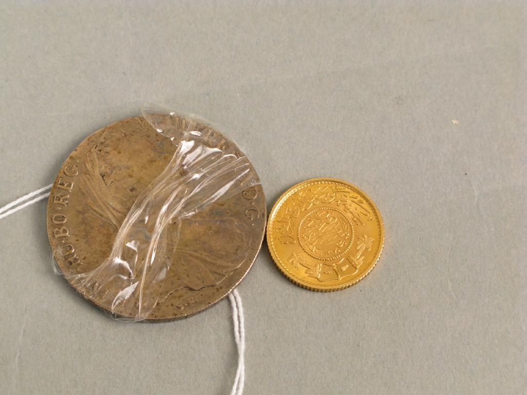 Appraisal: An Eastern gold coin and a German silver coin