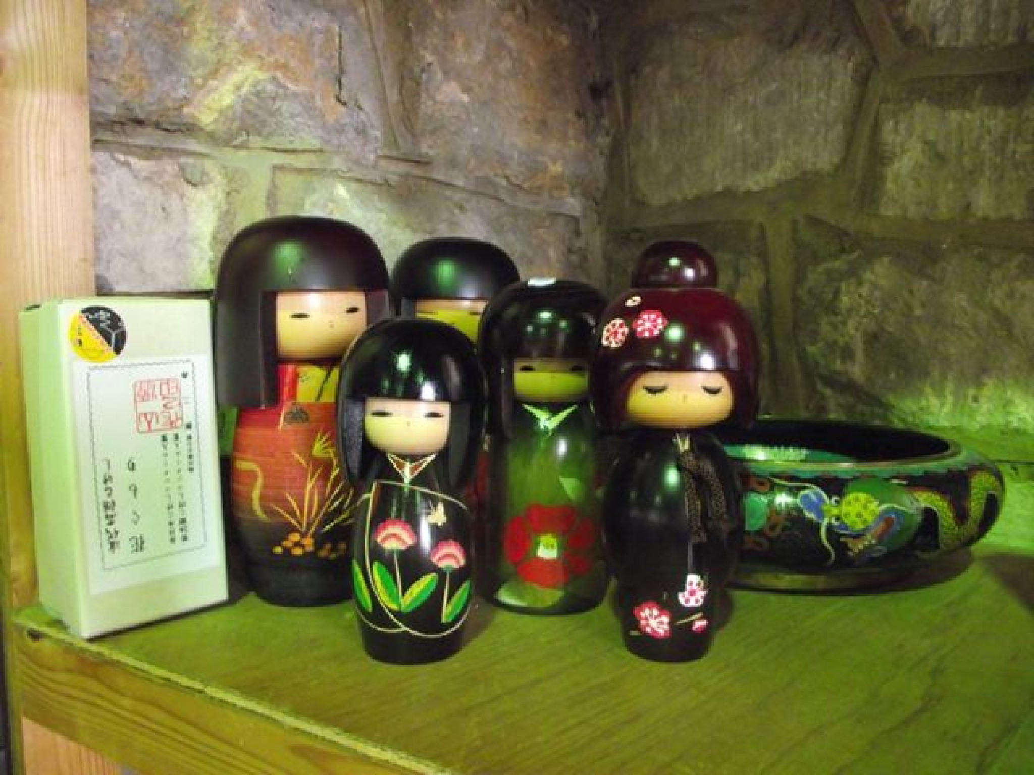 Appraisal: A selection of six contemporary worked Kokeshi dolls with painted