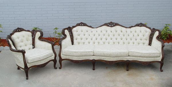 Appraisal: CARVED ITALIAN SOFA CHAIR Pierce carved mahogany frame Button tufted