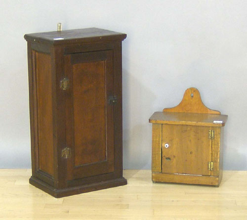 Appraisal: Mahogany hanging cabinet h w together with a pine cabinet