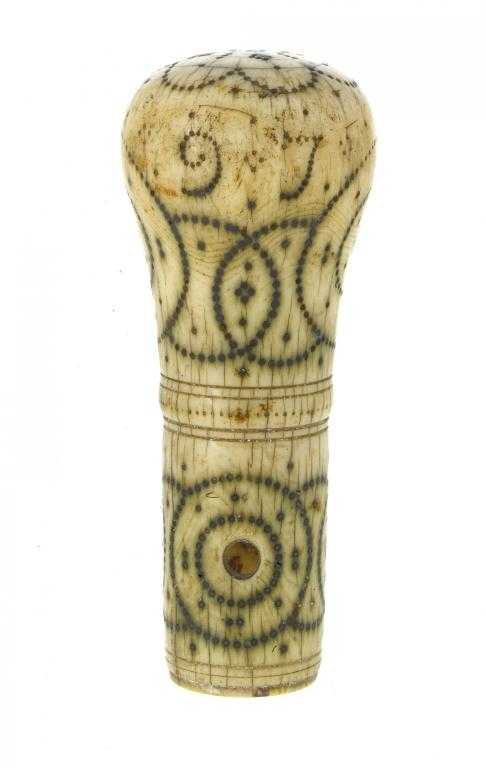 Appraisal: A WILLIAM III DATED IVORY AND PIQU CANE HANDLE the