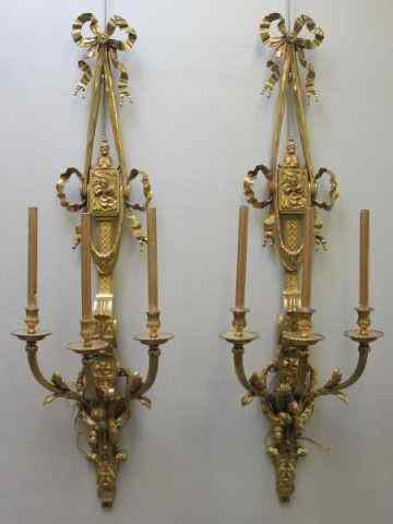 Appraisal: Pair of Arm Sconces with Ribbons and Tassels From a