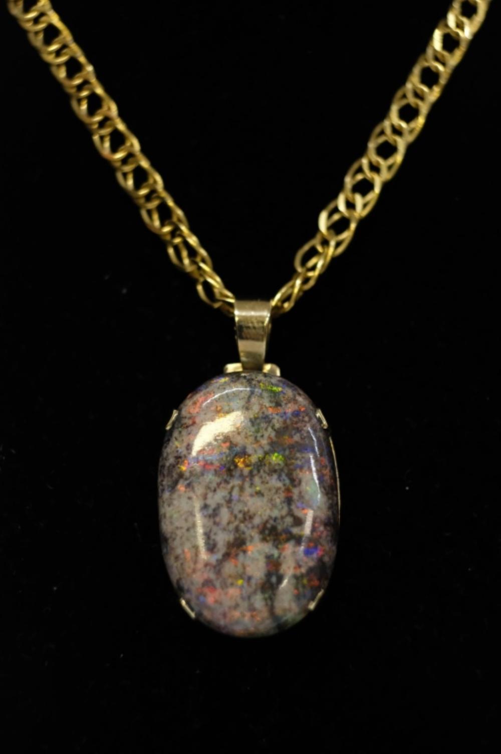 Appraisal: MASSIVE OVAL MATRIX OPAL PENDANT ON KMassive approx carat oval