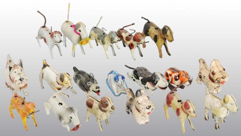 Appraisal: Lot of Tin Litho Dog Toys Description Japanese Working Includes