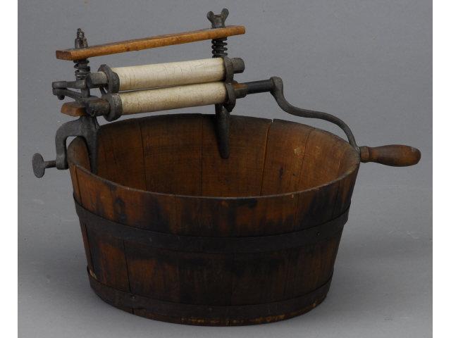 Appraisal: Doll Tub with Mangle America ca banded wood tub with