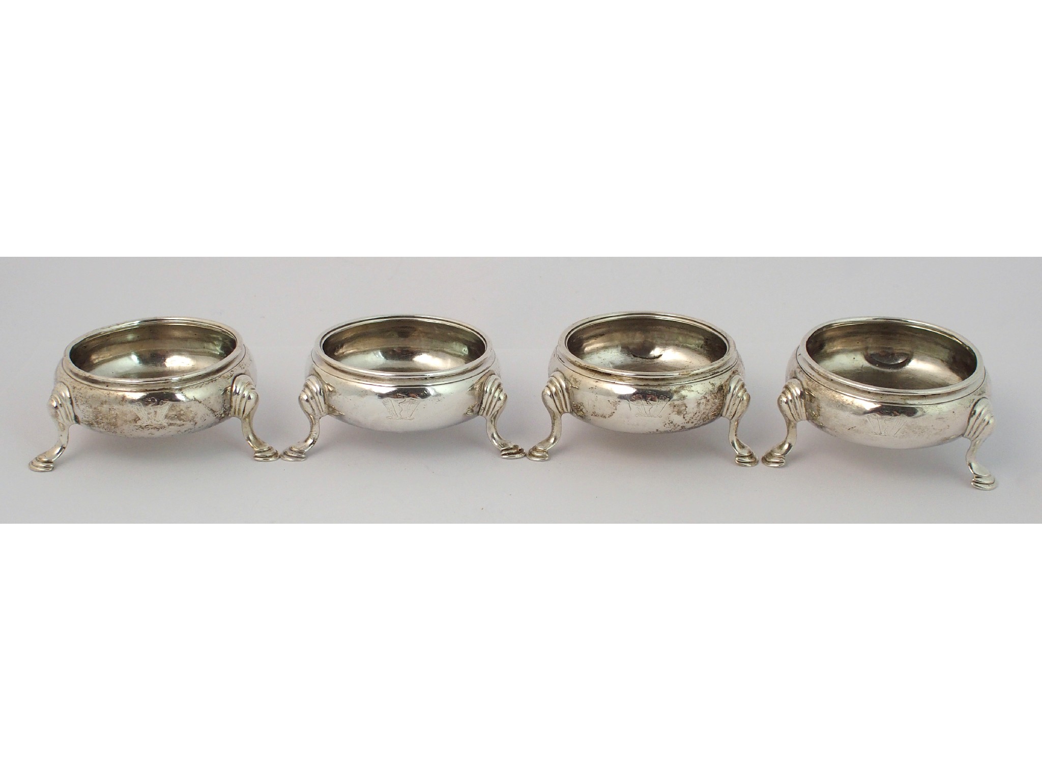 Appraisal: A set of four George III silver saltsby Samuel Meriton