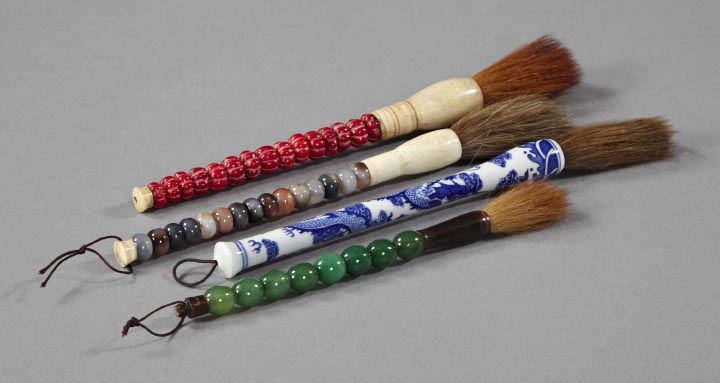 Appraisal: Group of Four Decorative Chinese Calligraphy Brushes the handles in