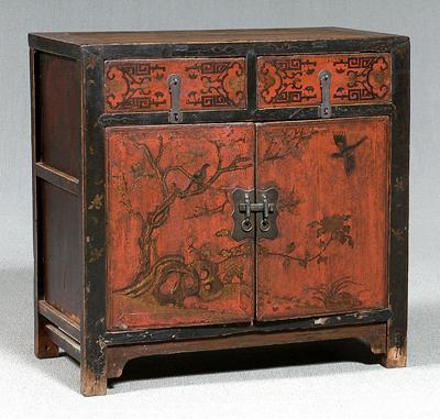 Appraisal: Chinese red lacquered cabinet two drawers over two doors brass