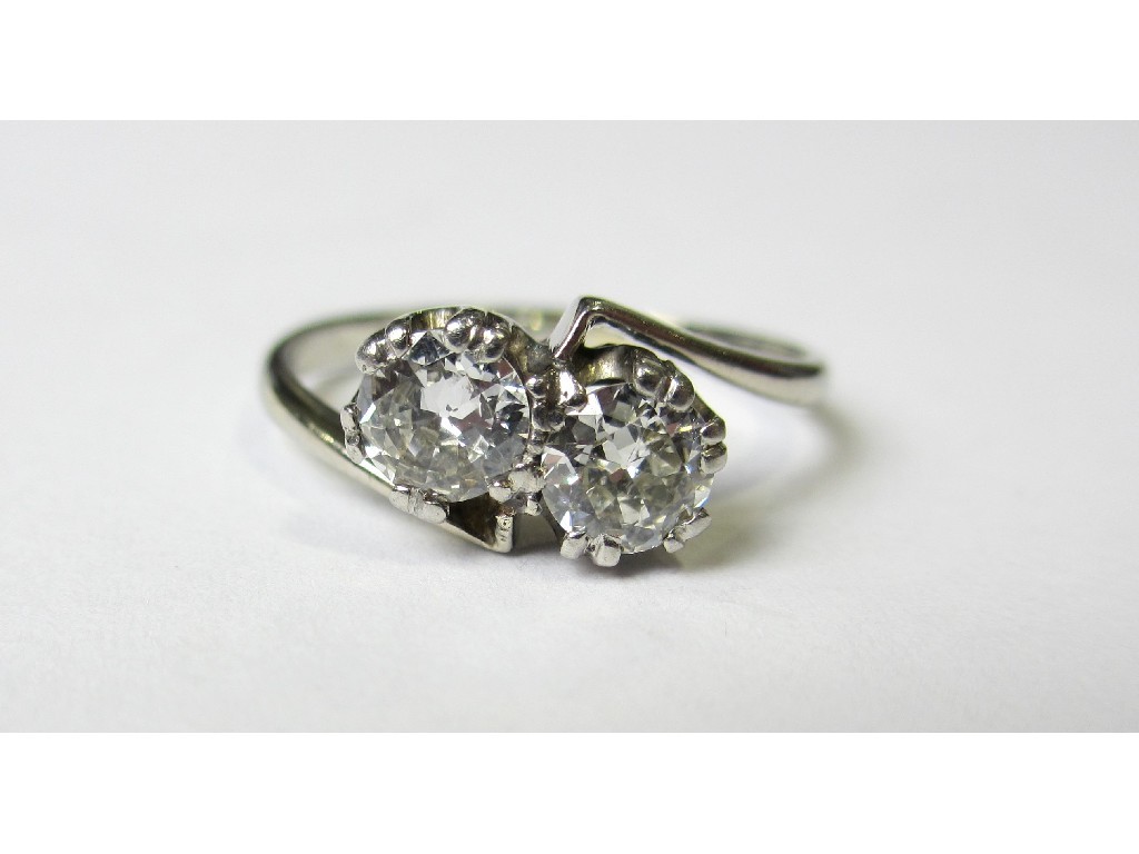 Appraisal: An eighteen carat white gold and platinum diamond two stone