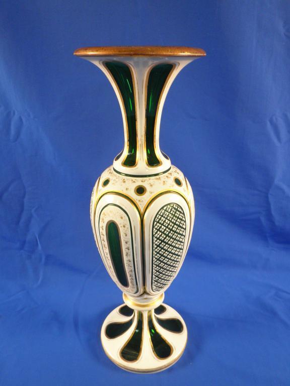 Appraisal: A late thC Bohemian green glass vase with white overlay