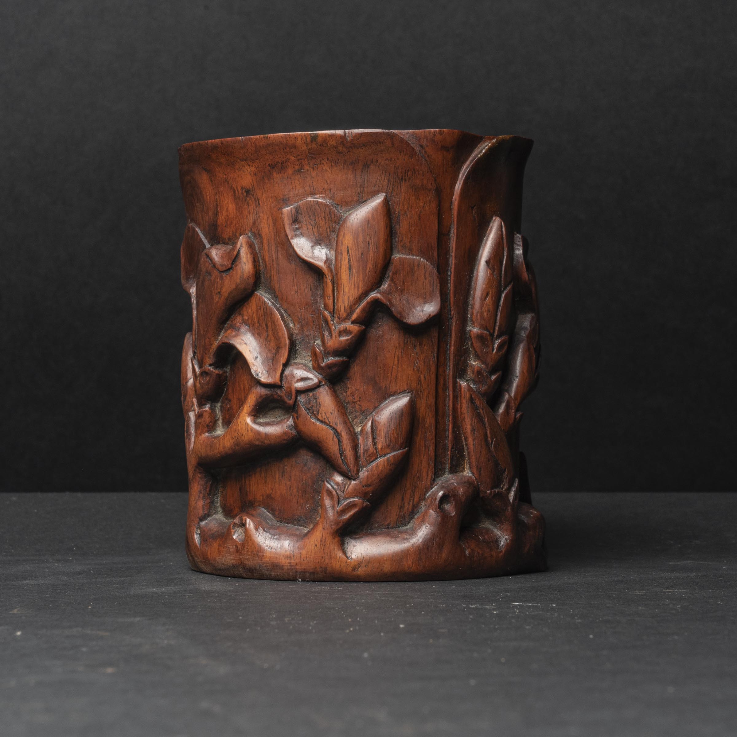 Appraisal: A Carved Huanghuali Orchid-Form Brush Pot th th Century height