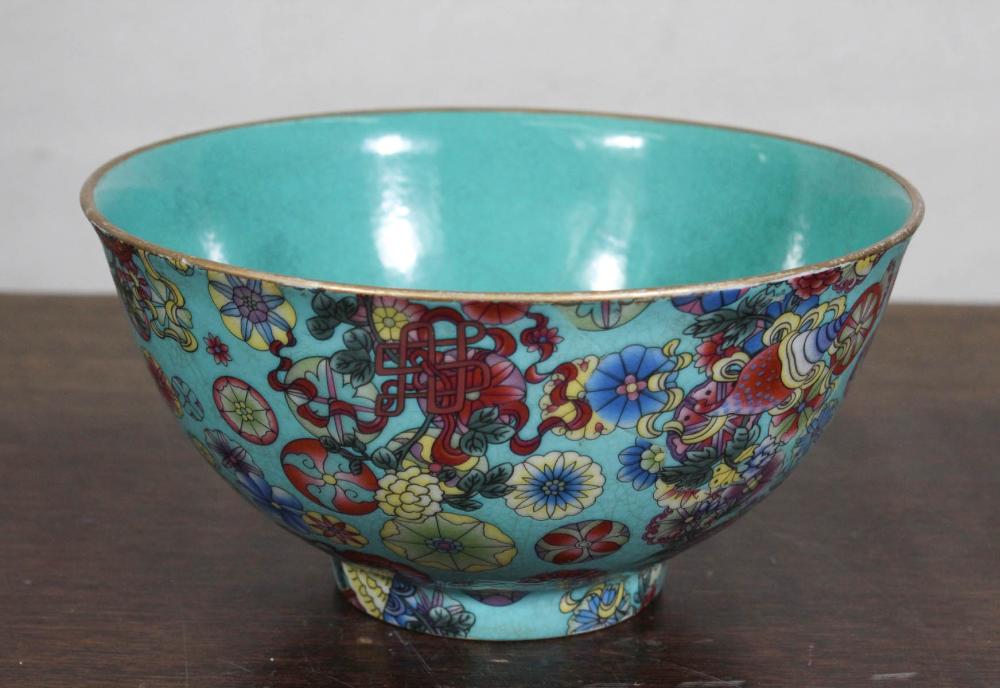 Appraisal: CHINESE PORCELAIN BOWL hand painted underglaze featuring scattered floral and