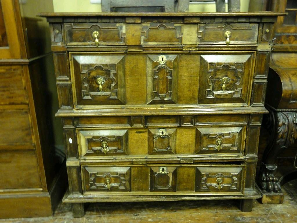 Appraisal: A th century oak two sectional chest fitted with four