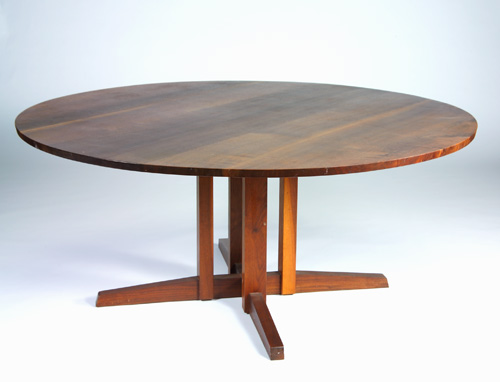 Appraisal: GEORGE NAKASHIMA Walnut Cluster-base dining table with sap-streaked circular top