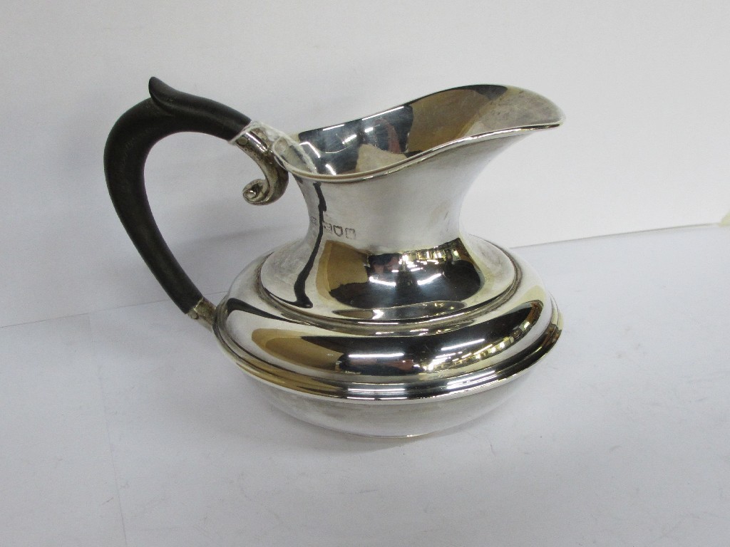 Appraisal: A silver ale jug London