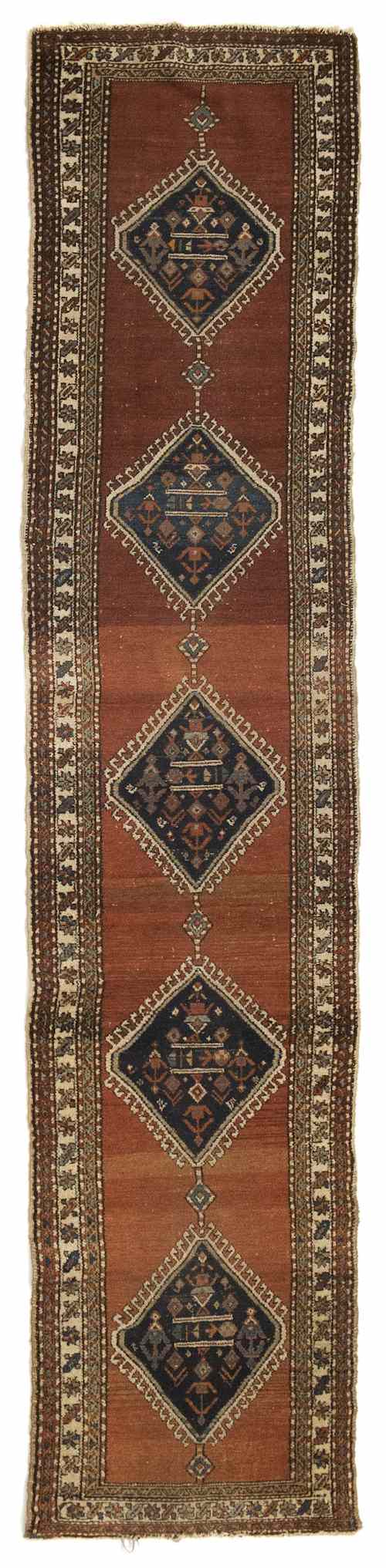 Appraisal: Hamadan runner ca with five medallions on a red field