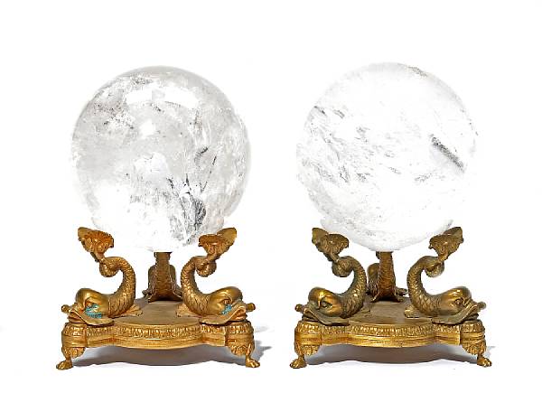 Appraisal: A pair of Empire style rock crystal orbs on gilt