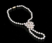 Appraisal: A Strand of Freshwater Baroque Pearls A long strand of