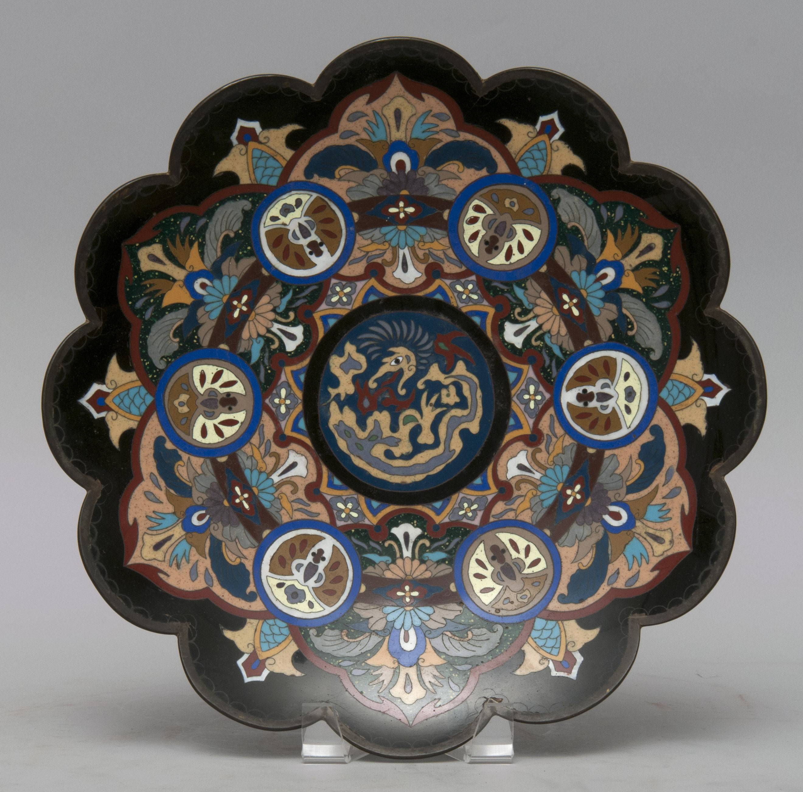 Appraisal: CLOISONN ENAMEL PLATE Meiji PeriodIn flower form with dragon center