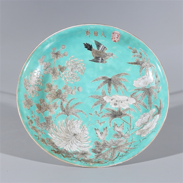 Appraisal: Chinese turquoise ground porcelain charger with flowers bird and calligraphy