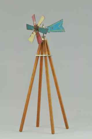 Appraisal: ARCADE WINDMILL TOY Windmill made of wood support pressed steel