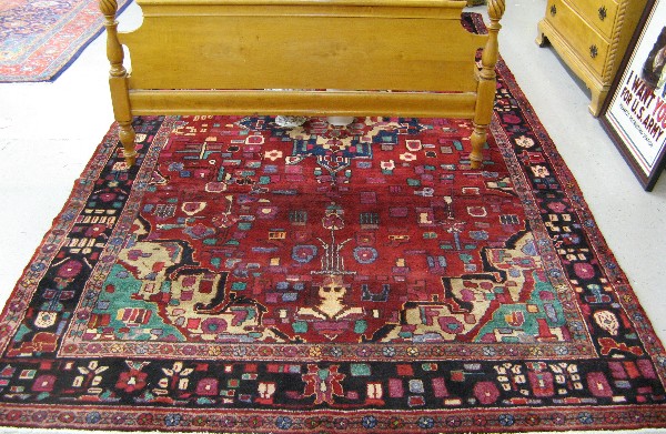 Appraisal: PERSIAN TRIBAL HAMADAN CARPET stylized floral and central medallion design