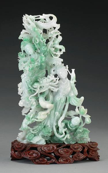 Appraisal: A mottled green and white jadeite group of female immortals