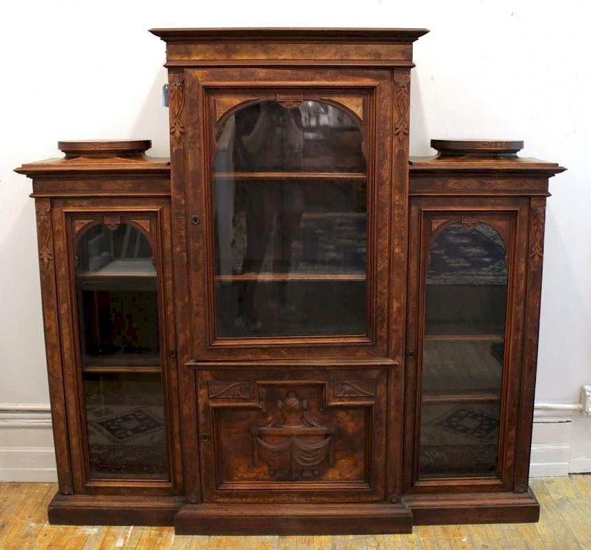 Appraisal: Victorian Glass-Front Display Cabinet Victorian tripartite walnut and figural mahogany-veneered