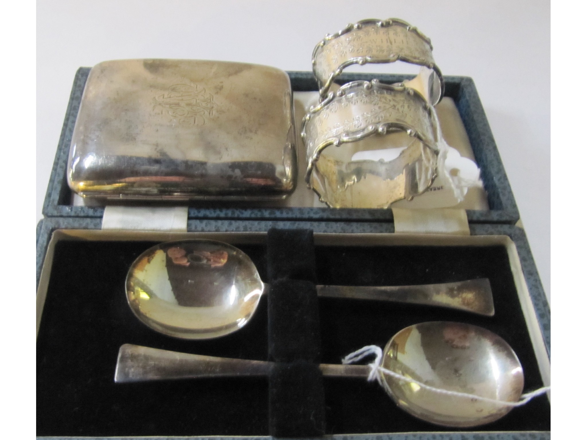 Appraisal: A lot comprising a cased set of silver spoons two