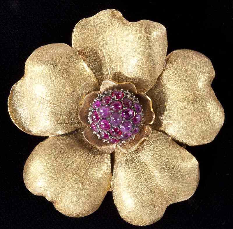 Appraisal: Gold and Ruby Clip Brooch Mario Buccellaticirca designed as a