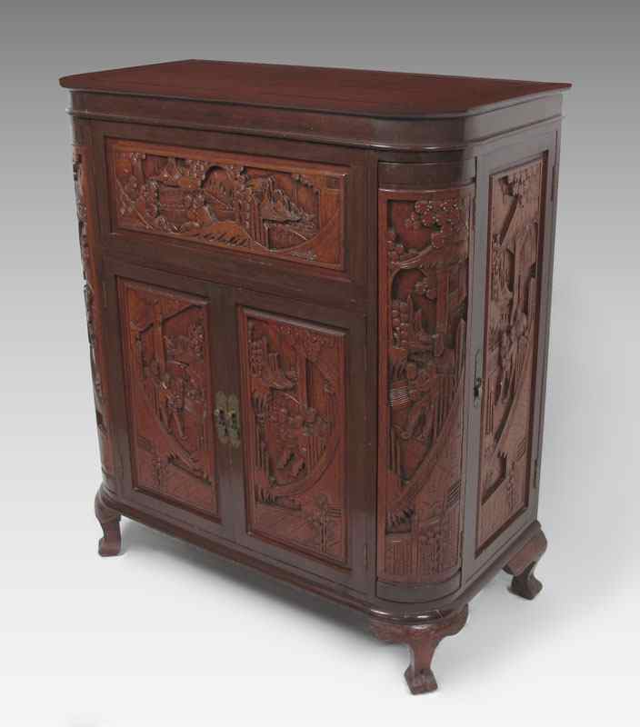 Appraisal: CARVED ORIENTAL LIFT TOP BAR Carved front and sides with