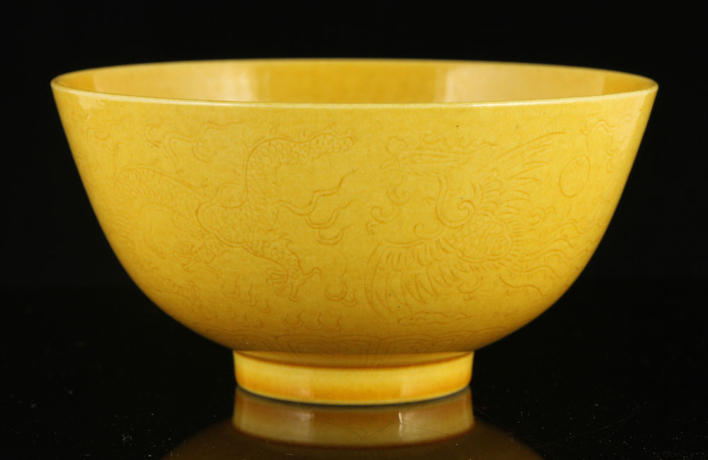 Appraisal: - Chinese Yellow Glazed Carved Phoenix and Dragon Bowl Yellow