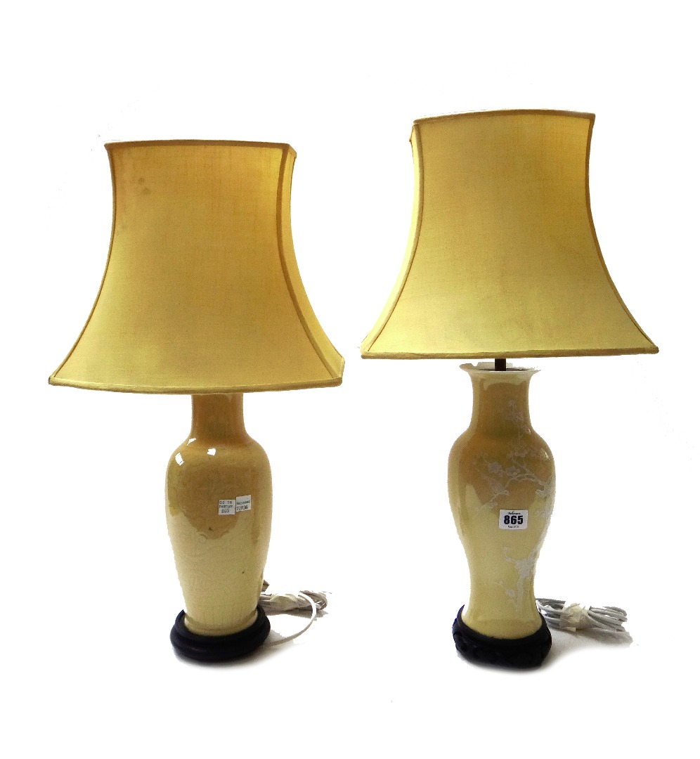 Appraisal: Two similar Chinese style pottery vase table lamps with yellow