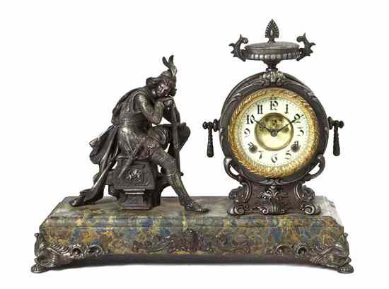 Appraisal: An American Cast Metal Mantel Clock having a circular dial