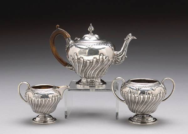 Appraisal: A Victorian silver three piece bachelor's tea set after the