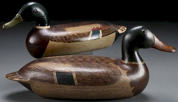 Appraisal: A PAIR OF PAINTED WOOD DUCK DECOYS A PAIR OF