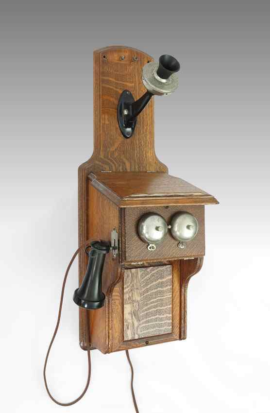 Appraisal: WESTERN ELECTRIC OAK WALL PHONE Cord converted to modern plug