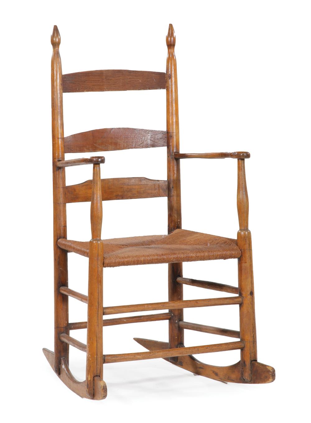 Appraisal: Shaker Ladder-Back Rocking Chair th c shaped arms rush seat