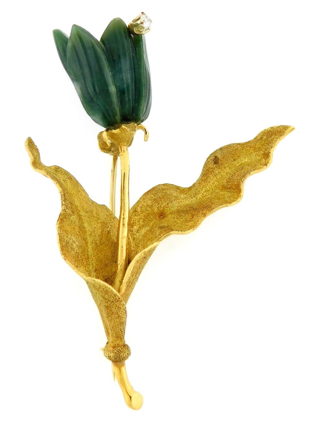 Appraisal: JEWELRY Stamped K yellow gold nephrite and diamond flower brooch