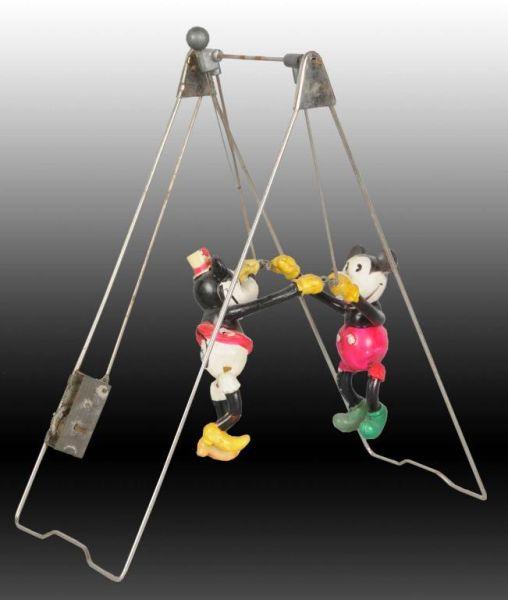 Appraisal: Disney Mickey Minnie Swinging Exhibition Toy Description Toy includes original