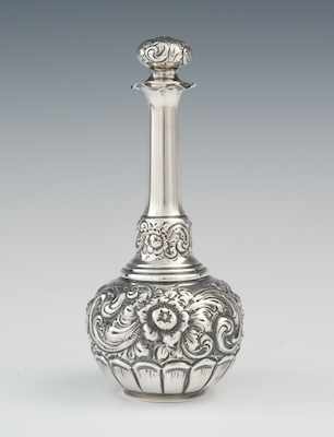 Appraisal: An Antique Sterling Silver Repousse Perfume Bottle by Redlich Co