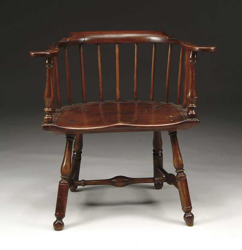 Appraisal: PENNSYLVANIA LOW WINDSOR ARMCHAIR Wide carved saddle seat thirteen round